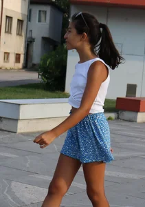 Skinny girl wearing shorts on the street