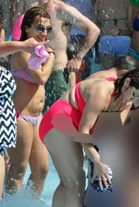 Two thick milfs at the pool in bikinis