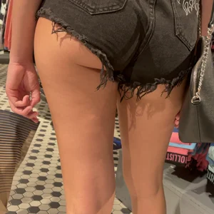 T33ns shopping denin short close up