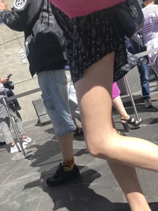 Long Skinny Legs in a Skirt and Feet in Sandals Closeup Creepshots on the Street