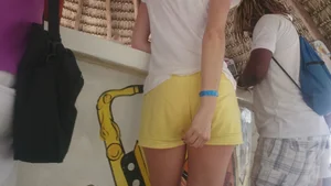 Milf in yellow shorts with vpl and a wedgie