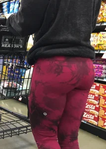 Milf grocery shopping in red leggings with a great ass