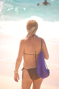 Various sexy candid girls in bikinis at the beach
