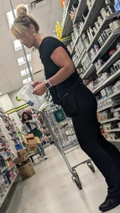 Beautiful tight blonde in black legging at dollar strore. oc