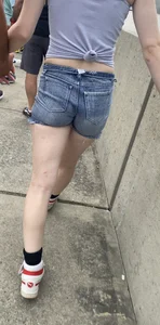 Tight ass in grey jean shorts.
