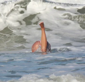 Hot surfer chicks out in the water