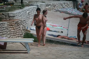 3 amazing topless girls on a nudist beach