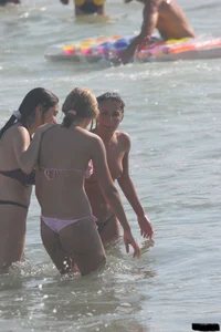 Beach voyeur babes in bikinis, thongs and topless