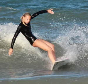 Hot surfer chicks out in the water