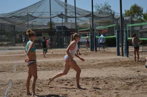 Beach volleyball blonde looking sexy and showing her body off