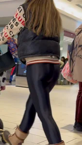 Skinny Milf in glossy leggings