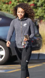 Beautiful black girl in Nike leggings in the parking lot