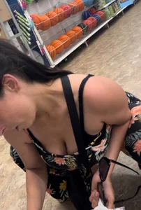 Milf showing cleavage and tight ass