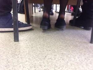 College Girl’s Feet in Black Pantyhose With Shoes Half Taken Off Under Table Candid Photos