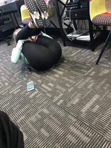 Girl in Sneakers and Yoga Pants Working Out on the Floor