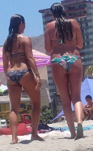 Thick and skinny sexy friends on the beach in bikinis