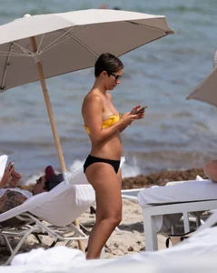 Frankie Bridge nip slips in a bikini on the beach