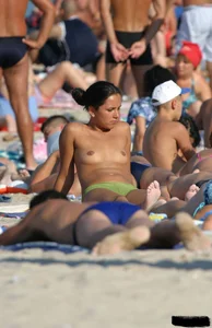 Beach voyeur girls in bikinis, thongs and topless