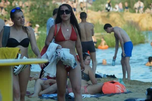 Amazing Girl in Red Swimsuit and Sunglasses with Small Breast Walking on the Beach Hot Creepshots