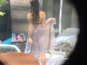 Hot girl at the pool in her bikini with big tits