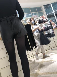 Shop Assistant's Flat Booty in Leather Shorts And Legs in Black Pantyhose Store Creepshots Gallery