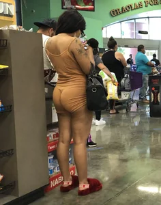 Latina with hard nipples and a big booty in tight spandex shorts outfit