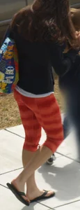 Beautiful brunette teen in orange patterned leggings