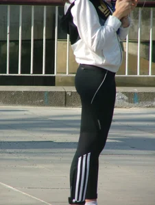 Girl with a nice booty out for a walk in tight Adidas leggings