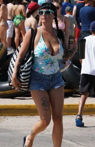 Girls in bikinis getting ready for tubing