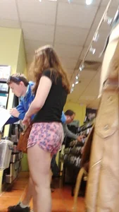 Girl at the record store in shorts with a nice booty and vpl