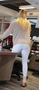 Gorgeous slim blonde in white jeans