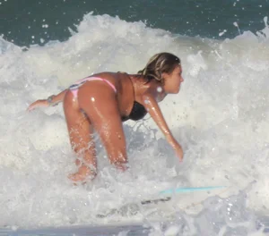 Hot surfer chicks out in the water