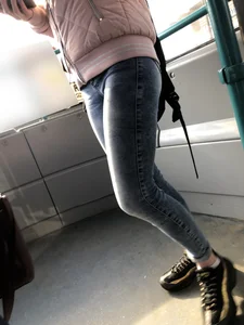 Candid teen in blue jeans