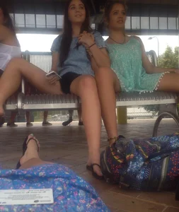 Girls in Dresses Sitting on the Bench at the Station, Flashing Their Panties And Spreading Legs