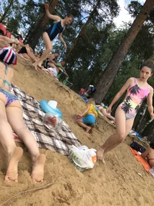 Girls in One-Piece Body Swimsuits Running Towards Water and Swimming - Beach Photo Gallery