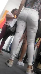 Latina with a nice ass in tight white jeans