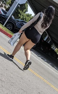 THICK BRUNETTE THIGHS IN GYM SHORTS