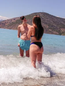 Thick lady at the beach in little blue bikini with big ass