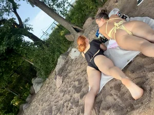 Large collection of hot beach girls lying on the beach and bending over