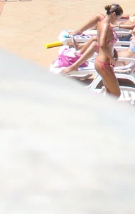 Hottie at the pool in thong bikini with a nice ass and tits