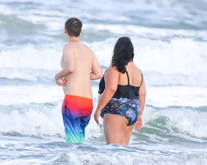 Extra thick girl at the beach in a bikini