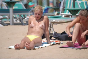Girls on a nude beach in Bibione, Italy