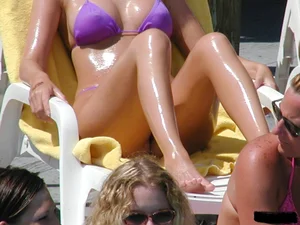 Beach voyeur girls in bikinis, thongs and topless