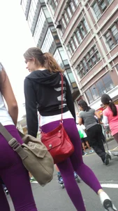 Girl out with a friend in purple leggings with a nice ass and slight vtl