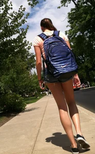 Hot college girl in little jean shorts showing some cheeks and legs