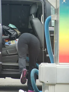 Girls cleaning their cars in jeans and pants