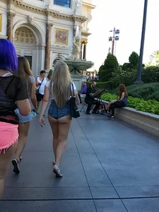 Big booty blonde showing a ton of her ass cheeks in shorts