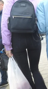 Juicy ass in black tight jeans and nice skinny legs street closeups