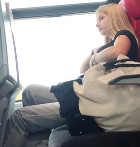 Hot busty blonde on train