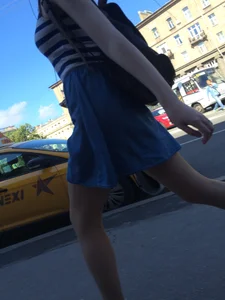 Girl in a Skirt With Sexy Skinny Legs Walking Down a Street Creepshots Collection